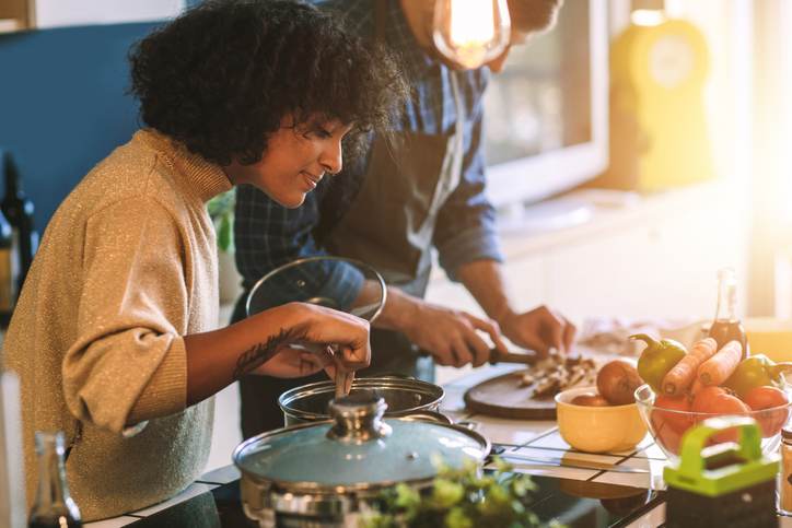 Friends Living And Cooking Together