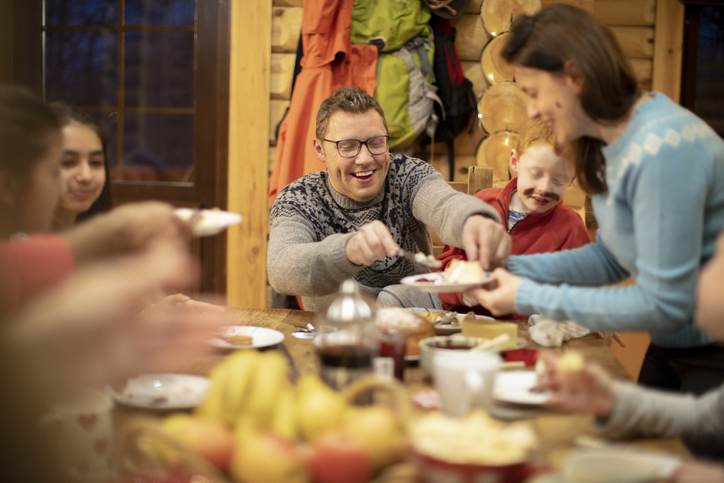 Serving Dessert to her Family